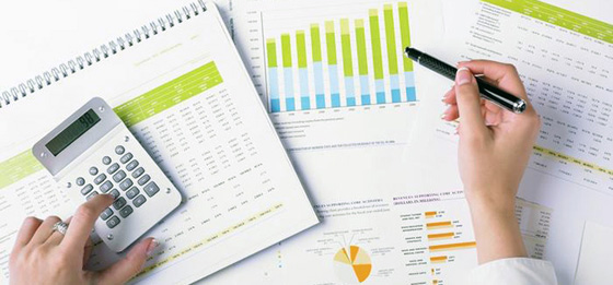 photo of calculator and charts