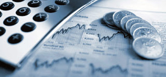 photo of calculator and coins